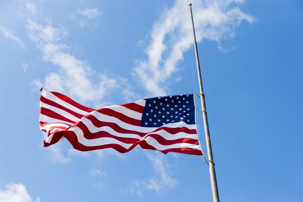 United States flag flying at a half-staff
